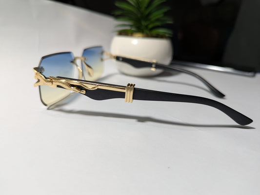 The Apex Predator: Gold & Black Rimless Sunglasses with Stylized Jaguar/Serpent Temples