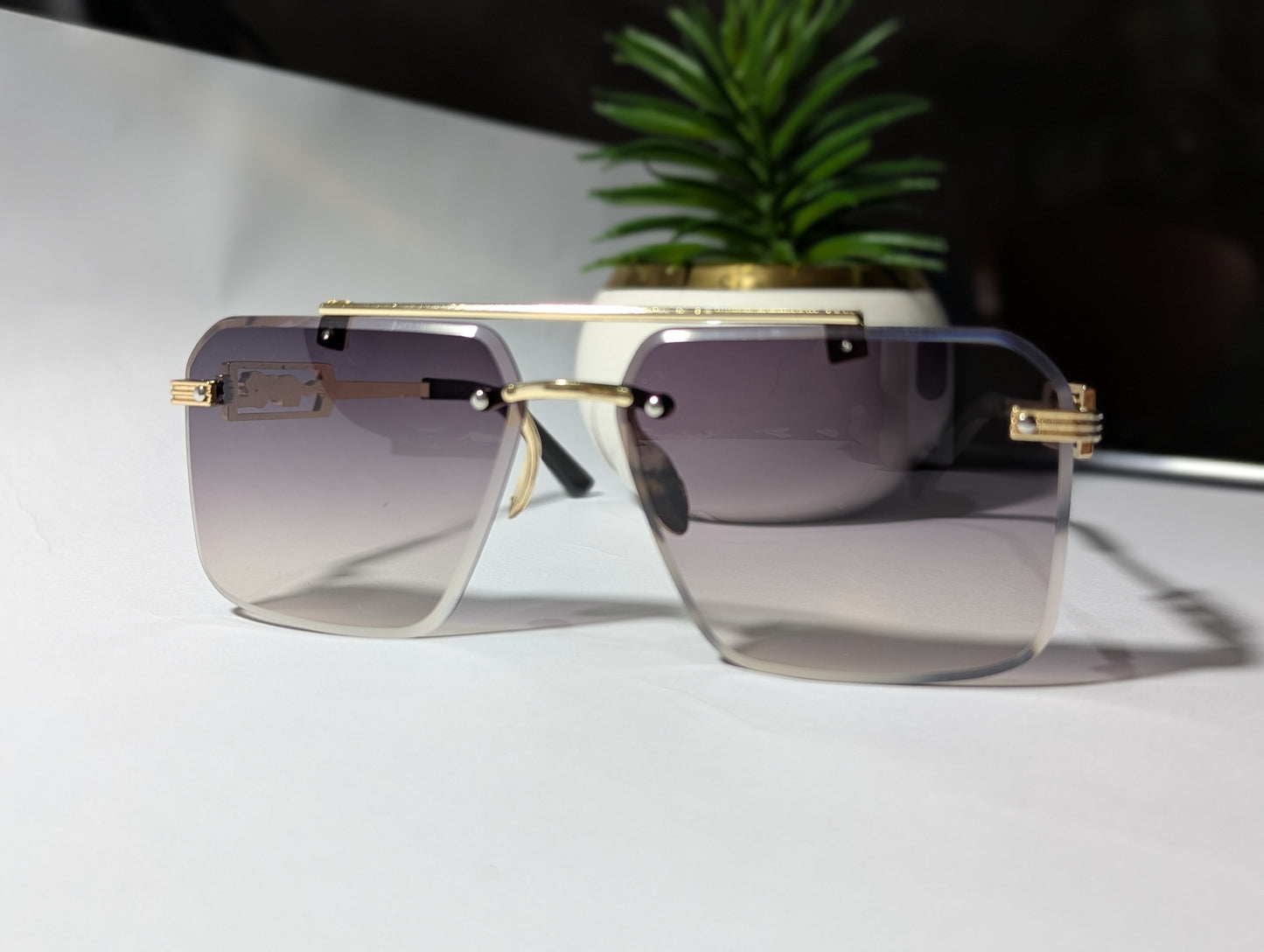 Luxury Rimless Metal Jaguar Embellished Sunglasses