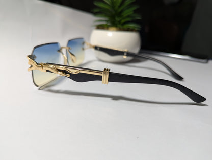 The Apex Predator: Gold & Black Rimless Sunglasses with Stylized Jaguar/Serpent Temples