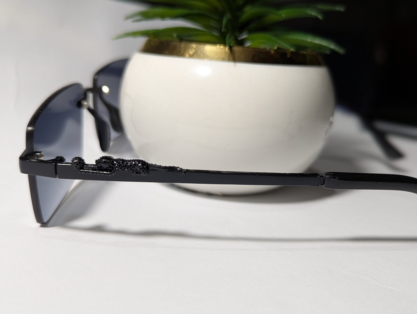 The Stealth Panther: All-Black Rimless Jaguar Sunglasses 🌑