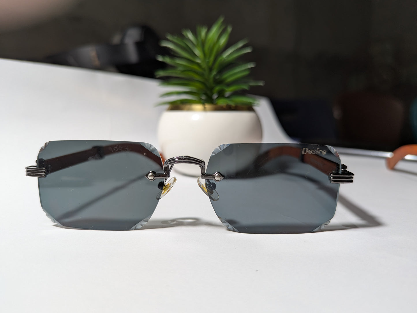 The Stealth Panther: All-Black Rimless Jaguar Sunglasses 🌑