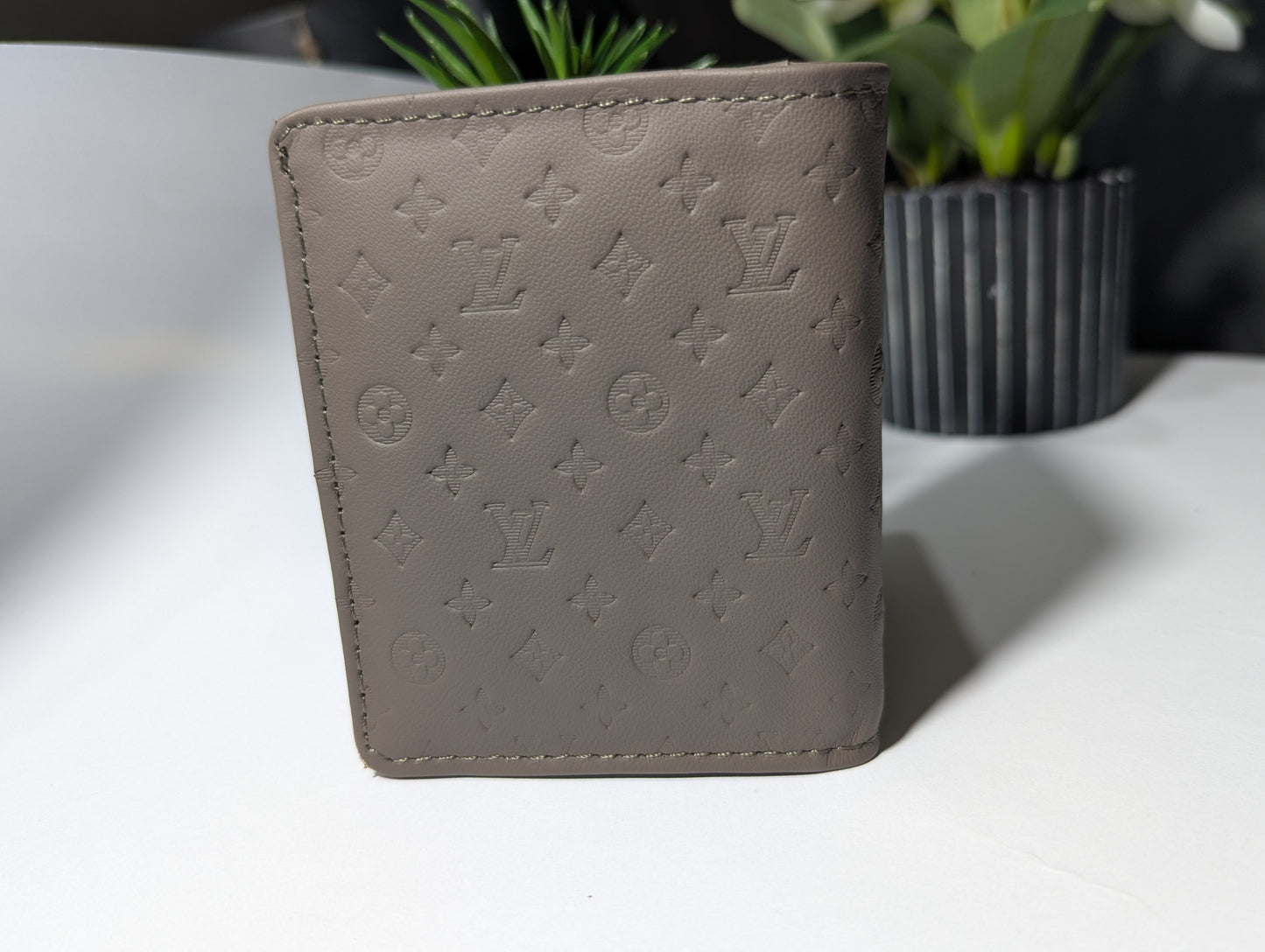 The Executive Slim: Genuine Leather Embossed Bi-Fold Wallet