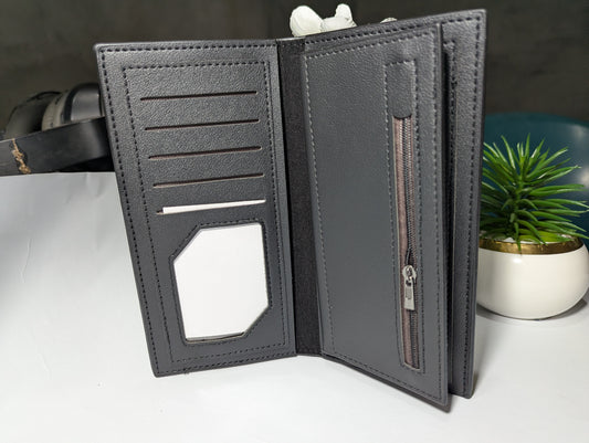 The Gotham Traveler: Sleek Black Leather Trench Wallet - Emblem Edition