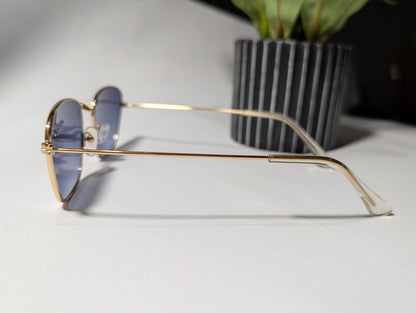 geometric luxe: gold frame angular sunglasses with twilight tint